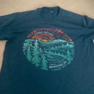 Greenish blue T-shirt with Sierra Nevada picture on front